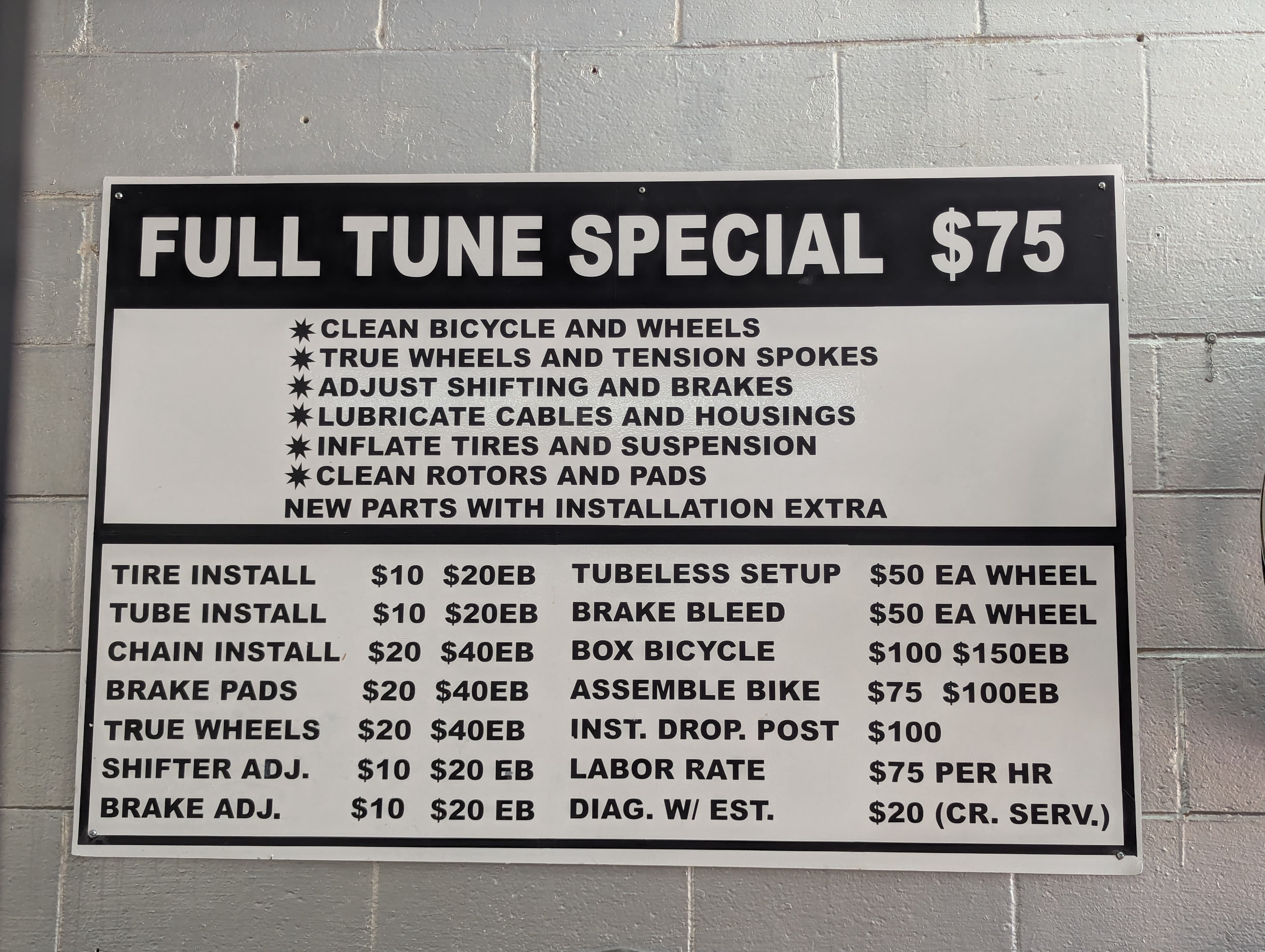 Hearns Cycling full tune special $75 pricing sign